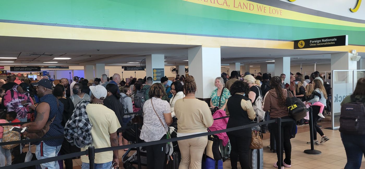 File photo: Travelers at a Caribbean airport