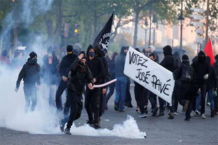 Protesters in tear gas in Paris