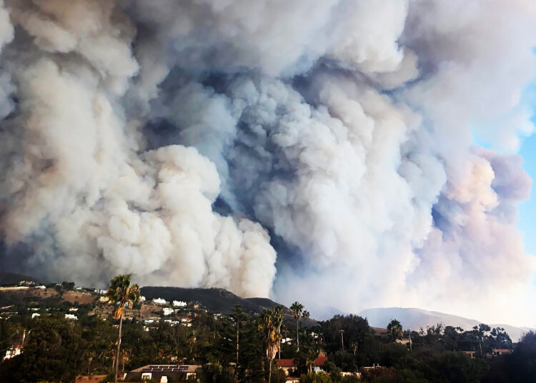Smoke rises over Malibu during a wildfire. (File photo)