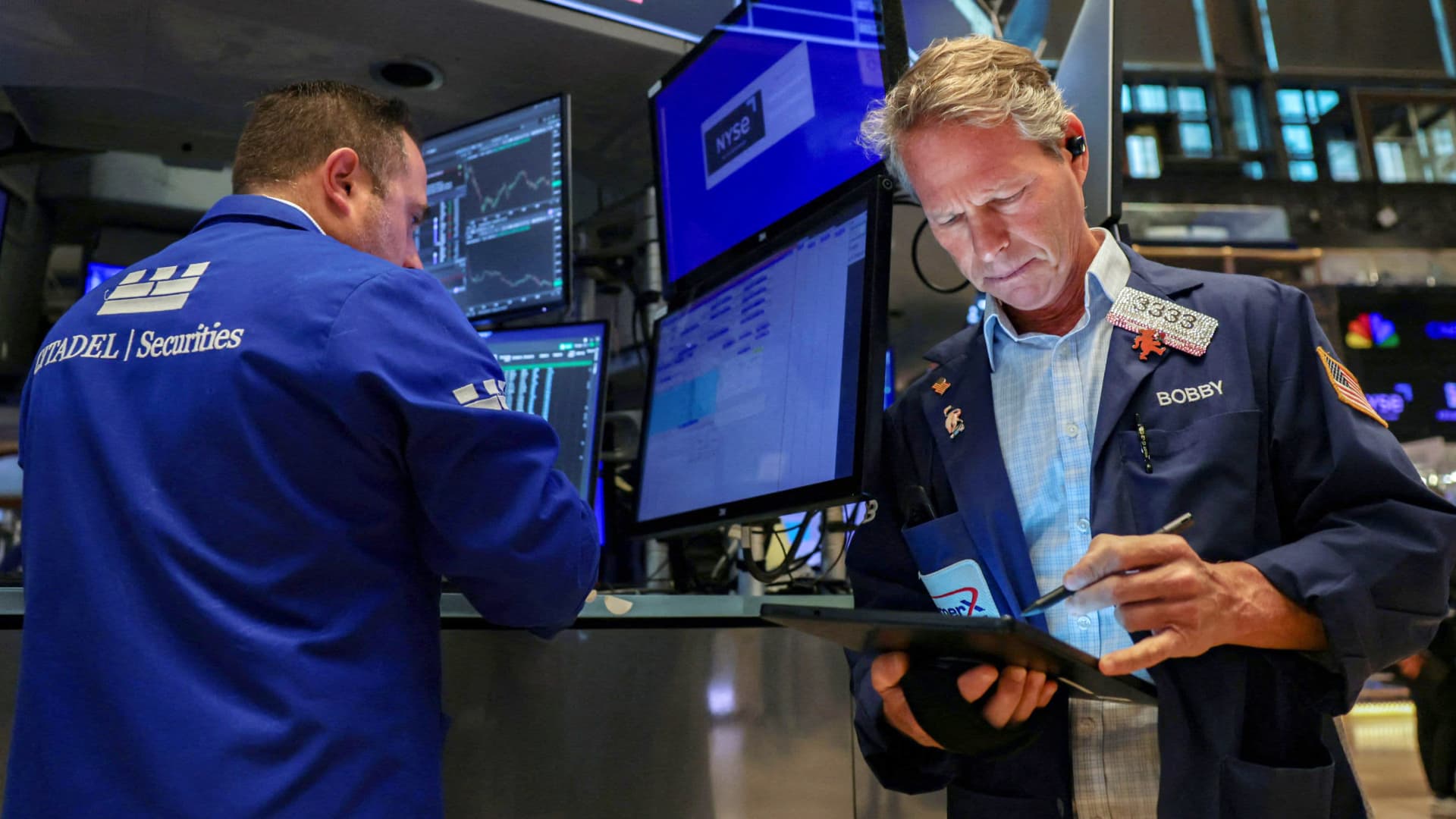 Traders on the floor of the New York Stock Exchange