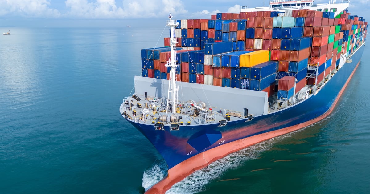Large container cargo ship sailing at sea