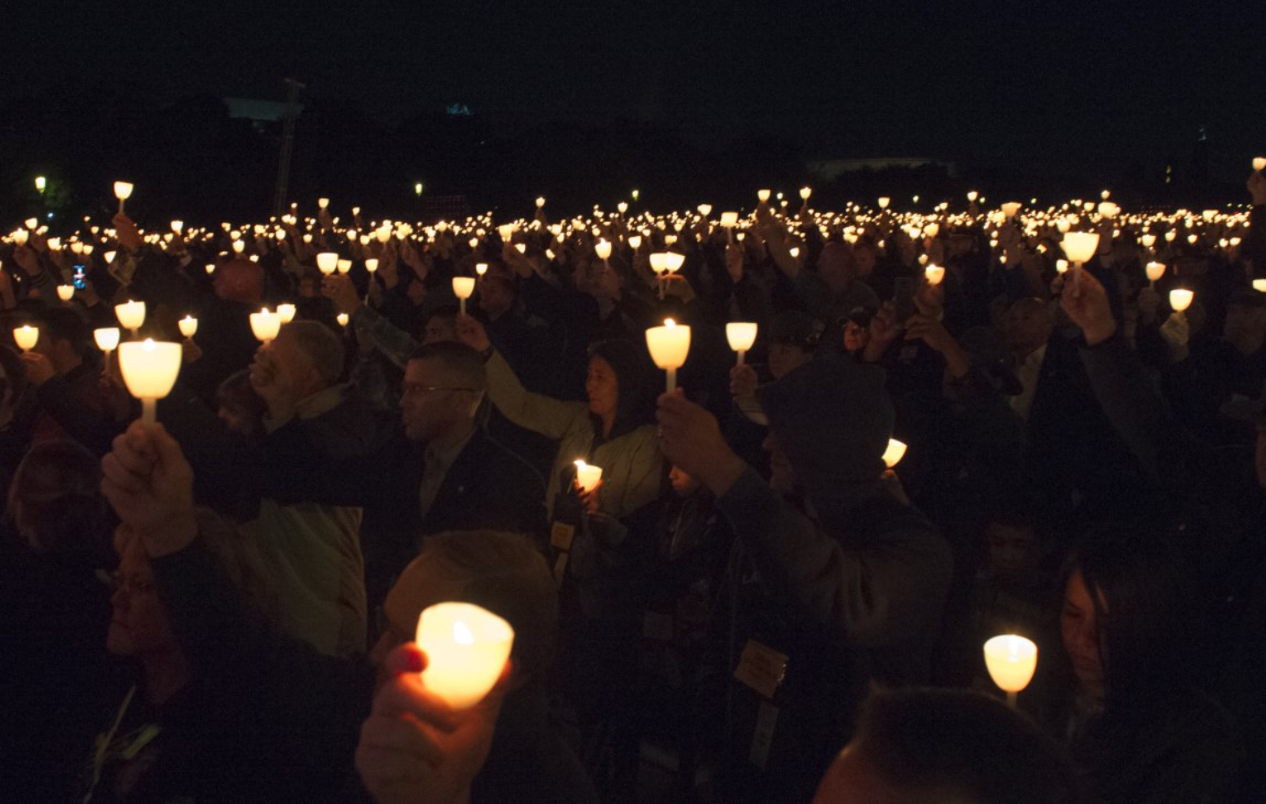 Candles at a community vigil